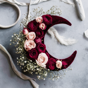 Crescent Moon flower arrangement with red and pink/blush roses and gypsophila by Elandra flowers, best flower shop in Dubai
